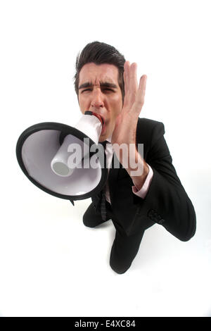 Geschäftsmann durch Megaphon schreien Stockfoto