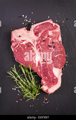 t-Bone Steak mit Gewürzen Stockfoto