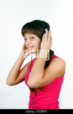 attraktive junge Mädchen anhören von Musik Stockfoto