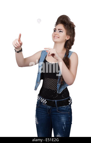 Teenager-Mädchen in einem blauen Denim-Kleid Stockfoto