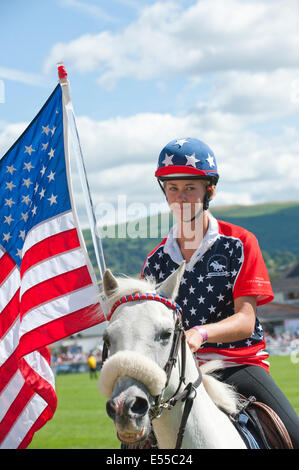 Llanelwedd, UK. 21. Juli 2014. Team USA im Ehrenring für die Royal Welsh montiert Spiele. Eine Rekordzahl von mehr als 240.000 Besucher dürften diese Woche vier Tage lang von Europas größten Agrarmesse. Vieh-Klassen und Sonderpreise haben angezogen, 8.000 plus Einträge, 670 mehr als im Vorjahr. Das erste Royal Welsh Show war bei Aberystwyth in 1904 und angezogen 442 Vieh Einträge. Bildnachweis: Graham M. Lawrence/Alamy Live-Nachrichten. Stockfoto