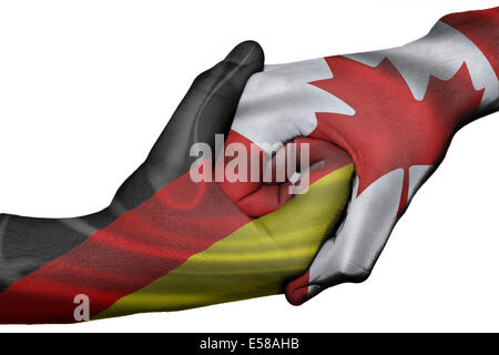 Diplomatischen Handshake zwischen den Ländern: Fahnen Deutschland und Kanada überdruckte die beiden Hände Stockfoto