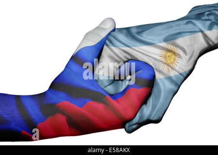 Diplomatischen Handshake zwischen den Ländern: Flagge von Russland und Argentinien überdruckte die beiden Hände Stockfoto