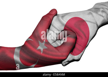 Diplomatischen Handshake zwischen den Ländern: Flaggen der Türkei und Japan überdruckte die beiden Hände Stockfoto