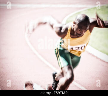 Sprinter vom Startblock Stockfoto