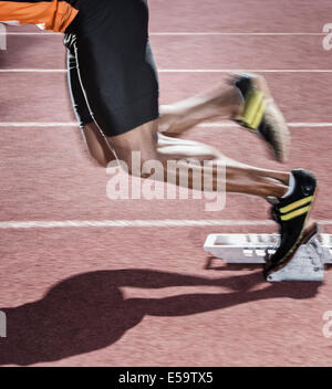 Läufer vom Startblock Stockfoto