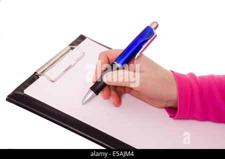 Weibliche Hand ist mit einem Kugelschreiber auf ein Blatt weißes Papier schreiben. Stockfoto