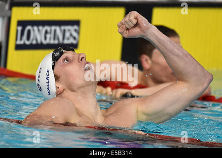 Glasgow, Schottland. 25. Juli 2014. Daniel Wallace von Schottland gewinnt die Herren 400m Lagenschwimmen beim Schwimmen am Tag 2 der 20. Commonwealth Games im Tollcross schwimmen Centre am 25. Juli 2014 in Glasgow, Schottland. (Foto von Roger Sedres/Gallo Images/Alamy Live News) Stockfoto