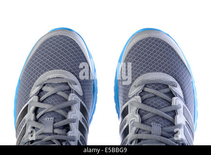 Draufsicht eines Paares von Silber und blau Adidas Laufschuhe Stockfoto