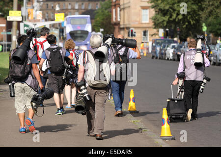 Glasgow-Schottland 28. Juli 2014. Commonwealth Games Tag 5.  Einige mehr strahlendem Sonnenschein genießen allgemeine Szenen aus rund um die Locations als Arbeitnehmer, Athleten und Zuschauer gleichermaßen. Die harten arbeiten Fotografen National Hockey Centre für den nächsten Ort zu verlassen. Stockfoto