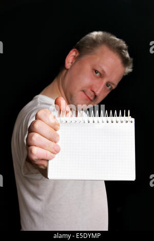 Man Betrieb leer Notebook, setzen Sie Ihren eigenen Text hier. Konzentrieren Sie sich auf dem Notebook! Stockfoto