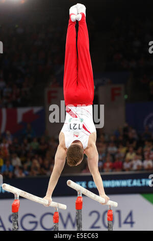 SSE Hydro, Glasgow, Schottland, Großbritannien, Dienstag, Juli 2014. Der englische Nile Wilson auf den parallelen Bars während des Artistic Turnen Team Competition bei den Commonwealth Games in Glasgow 2014 Stockfoto