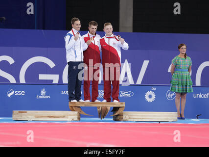 SSE Hydro, Glasgow, Schottland, Großbritannien, Mittwoch, Juli 2014. Medaillengewinnerin der Allround-Kunstturnen der Männer bei den Commonwealth Games 2014 in Glasgow. Von links nach rechts. Daniel Keatings, Schottland, Silver, Max Whitlock, England, Gold, Nile Wilson, England, Bronze Stockfoto