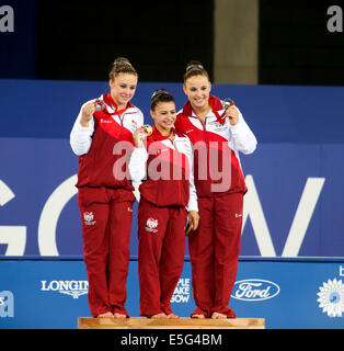 SSE Hydro Glasgow Schottland 30. Juli 2014. Commonwealth Games Tag 7.  Englands Mädchen nehmen Gold Silber und Bronze im Mehrkampf Frauen künstlerische Gymnastik Finale. Claudia Fragapane - Gold; Ruby Harrold - Silber; Hannah Whelan - Bronze.   L-R Harrold, Fragapane und Whelan. Bildnachweis: ALAN OLIVER/Alamy Live-Nachrichten Stockfoto