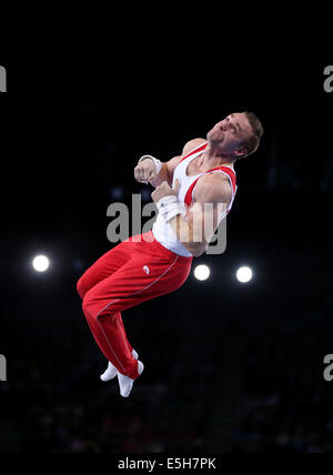 Glasgow, Schottland. 31. Juli 2014. Scott Morgan von Kanada konkurriert am 31. Juli 2014 der Herren Ringe Finale der künstlerischen Gymnastik bei den 2014 Glasgow Commonwealth Games in der SSE Hydro in Glasgow, Schottland. Scott Morgan gewann die Goldmedaille mit 15,100 Punkte. Bildnachweis: Han Yan/Xinhua/Alamy Live-Nachrichten Stockfoto