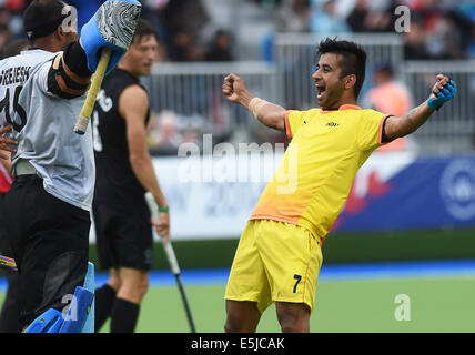 Glasgow, Schottland. 2. August 2014. Indiens Manpreet Singh feiert Sieg über Neuseeland. Neuseeland im Vergleich zu Indien Semi Finale im Glasgow National Hockey Stadium. Glasgow Commonwealth Games 2014. Bildnachweis: Aktion Plus Sport/Alamy Live-Nachrichten Stockfoto