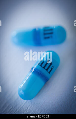 Alli ist eine halbe Dosis-Version von der Diät Medikament Xenical (Orlistat) hergestellt von GlaxoSmithKline (GSK). Stockfoto
