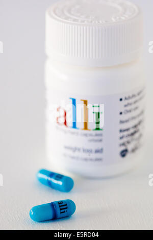 Alli ist eine halbe Dosis-Version von der Diät Medikament Xenical (Orlistat) hergestellt von GlaxoSmithKline (GSK). Stockfoto
