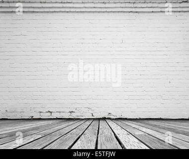 Innenraum mit weißen Ziegelmauer und Holzboden Stockfoto