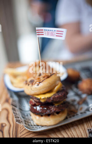 Krapfen-Burger Stockfoto