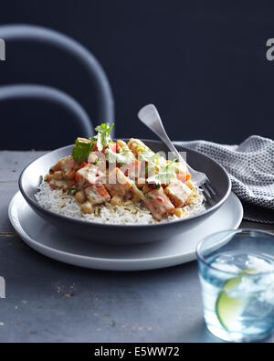 Schüssel mit Butternut-Kürbis Curry auf Reis Stockfoto