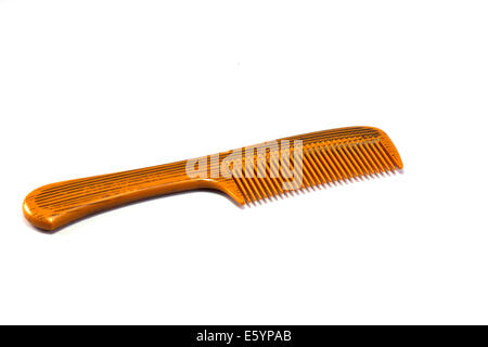 Kamm auf Papierhintergrund Stockfoto