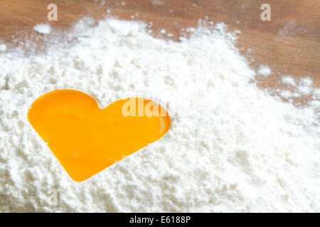 Ei Eigelb Mehl lieben Backen abstraktes Konzept Stockfoto