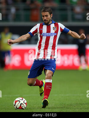 Wolfsburg, Deutschland. 10. August 2014. Madrids Gabi in Aktion während der Fußball-Testspiel zwischen VfL Wolfsburg und Atletico Madrid im Volkswagenarena in Wolfsburg, Deutschland, 10. August 2014. Foto: Ronny Hartmann/Dpa/Alamy Live News Stockfoto