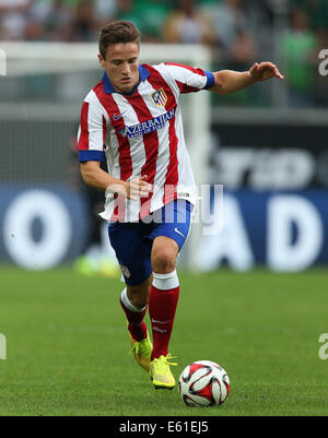 Wolfsburg, Deutschland. 10. August 2014. Madrids Saul Niguez in Aktion während der Fußball-Testspiel zwischen VfL Wolfsburg und Atletico Madrid im Volkswagenarena in Wolfsburg, Deutschland, 10. August 2014. Foto: Ronny Hartmann/Dpa/Alamy Live News Stockfoto