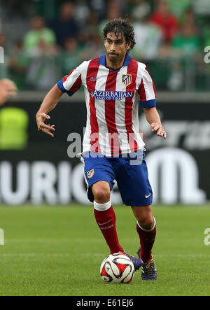 Wolfsburg, Deutschland. 10. August 2014. Madrids Tiago in Aktion während der Fußball-Testspiel zwischen VfL Wolfsburg und Atletico Madrid im Volkswagenarena in Wolfsburg, Deutschland, 10. August 2014. Foto: Ronny Hartmann/Dpa/Alamy Live News Stockfoto