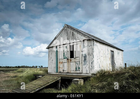 Ein altes Shed Boathouse Bootshaus auf Wallasea Island in Essex im Vereinigten Königreich. Stockfoto