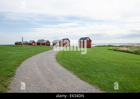 Roten Hütten in einem kleinen Fischerdorf Dorf auf der schwedischen Insel Öland in der Ostsee Stockfoto