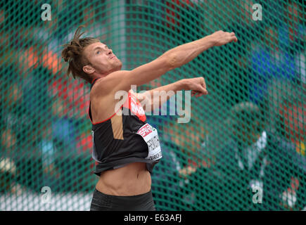 Zürich, Schweiz. 13. August 2014. Rico Freimuth Deutschland konkurriert im Diskuswerfen Event von Decathlon Wettbewerb am Europäischen Leichtathletik Weltmeisterschaften 2014 im Letzigrund Stadion in Zürich, Schweiz, 13. August 2014. Foto: Bernd Thissen/Dpa/Alamy Live News Stockfoto