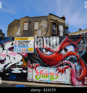 Graffiti-Wand-Kunst in East London Stockfoto