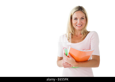 Glücklich reife Schüler Holding-notebooks Stockfoto