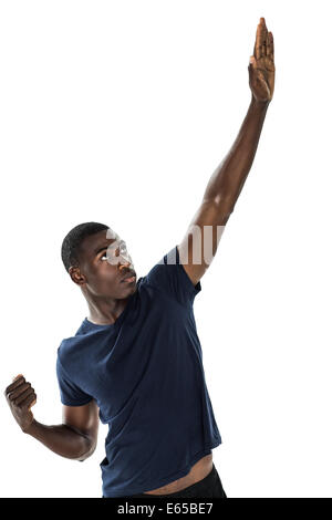 Ernster junger Mann mit Handgesten Stockfoto