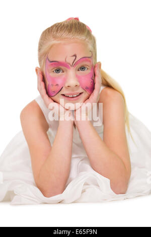 Glückliche kleine Mädchen in Schmetterling Gesicht malen Stockfoto