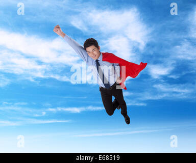Super Geschäftsmann in der Luft Stockfoto
