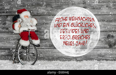 Lustige Weihnachtskarte in rot und weiß mit deutschen Texten und einem Weihnachtsmann. Stockfoto