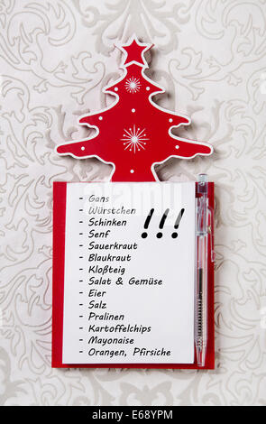 Christmas shopping-Liste in deutschen Buchstaben. Xmas-Organizer für Geschenke. Roten und weißen Farben. Stockfoto