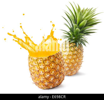 Ananas-Saft spritzt aus von seiner Frucht Stockfoto