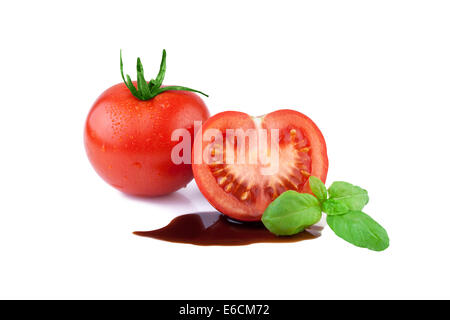 Tomaten mit Basilikum und Balsamico-Essig Stockfoto