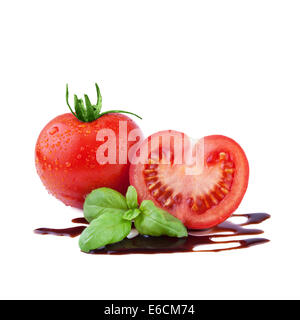 Tomaten mit Basilikum in Balsamico-Essig Stockfoto