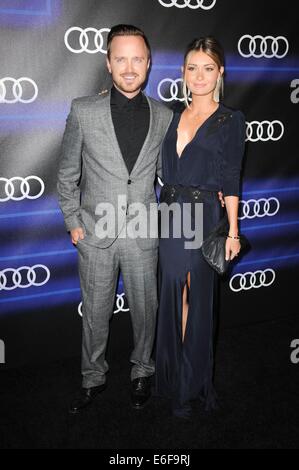 Los Angeles, CA, USA. 21. August 2014. Aaron Paul, Lauren Parsekian im Ankunftsbereich für Audi feiert Emmys Week 2014, Cecconis, Los Angeles, CA 21. August 2014. Bildnachweis: Elizabeth Goodenough/Everett Collection/Alamy Live-Nachrichten Stockfoto