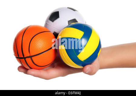 Hand der jungen mit kleinen Kugeln Stockfoto