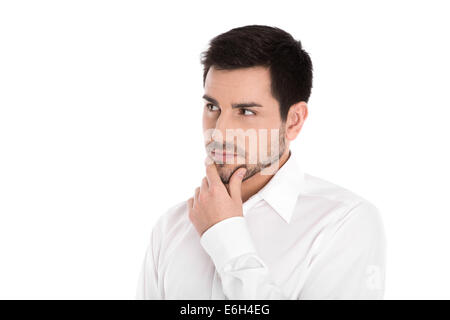 Ernst und nachdenklich isoliert junger Geschäftsmann seitwärts zum Text suchen. Stockfoto