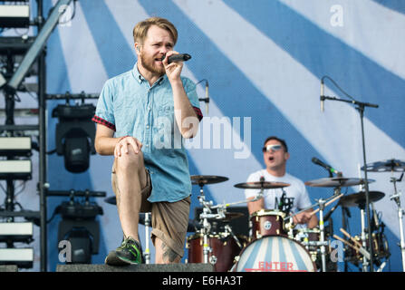 Leeds, UK. 23. August 2014. Roughton 'Rou' Reynolds von geben Sie Shikari führt auf der Bühne beim Leeds Festival im Braham Park am 23. August 2014 in Leeds, Vereinigtes Königreich. Bildnachweis: Sam Kovak/Alamy Live-Nachrichten Stockfoto