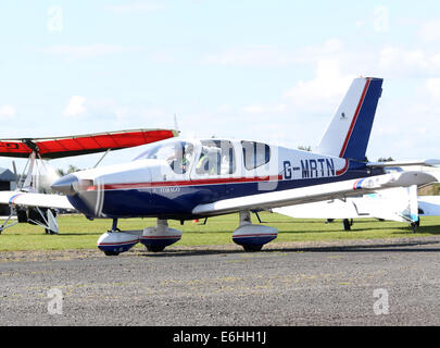 G-MRTN, ein 1980 Socata TB-10 Tobago. geben Passagier Flüge bei Hensridge Airshow, 23. August 2014 Stockfoto