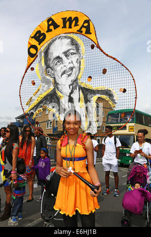 London, UK. 24. August 2014. Teilnehmer in der Parade am Kindertag in Notting Hill Karneval 2014, London. Der erste Tag des Karnevals ist traditionell für Kinder, aber viele Erwachsene auch mitmachen. Bildnachweis: Paul Brown/Alamy Live-Nachrichten Stockfoto