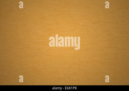 Gelber Stoff und Hintergrund Stockfoto